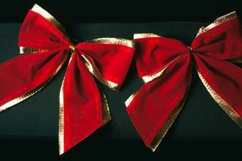 Red bow on a black background, Stock Photos