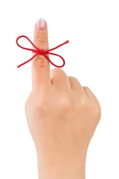 Red bow on finger 스톡 사진