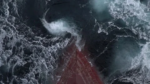 The red bow of the ship is submerged under sea water. Stock Footage 141112638