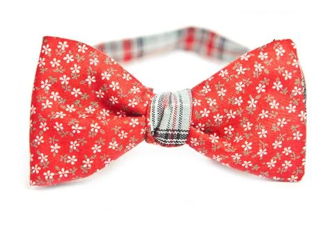 Red bow tie in flower pattern, close up, hipster style Stockfoto's