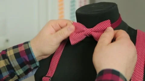 Red bow-tie on a mannequin Stock Footage 59725839