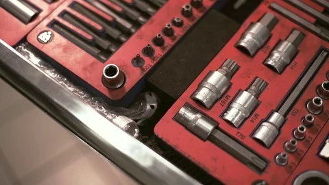 From the red box with auto tool man takes the crown for the key Stock Footage 71510276