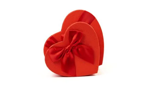 Red box in shape of heart. Gift box for Valentine's Day. Isolated on white ba Stock-Fotos