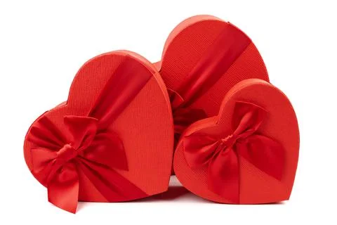 Red box in shape of heart. Gift box for Valentine's Day. Isolated on white ba Stock Photos