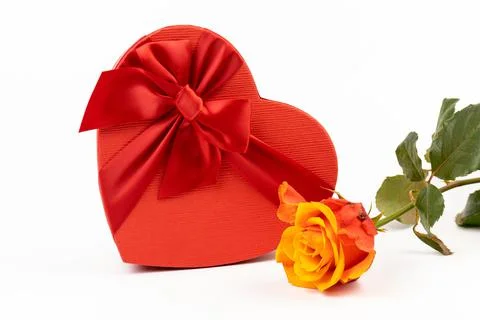 Red box in shape of heart. Gift box for Valentine's Day whith rose. Isolated  Stock Photos