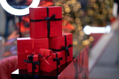Red boxes with gifts in large quantities for the holiday Stock Photos
