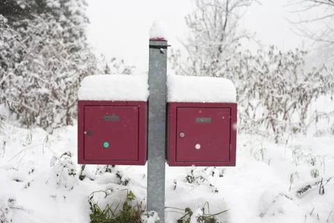 Red boxes in the snow Stock Photos