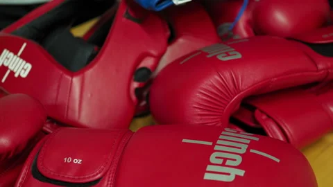 Red Boxing glove lay on the table . Russia, Saratov - april, 2019 Stock Footage 130369359