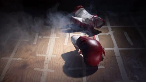 Red Boxing Gloves Falling Down On The Wooden Surface. 스톡 동영상 166552027