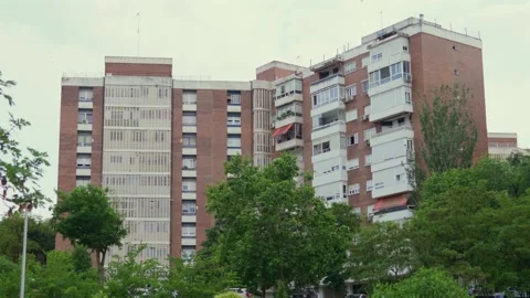 Red Brick Apartment Building and Neighborhood Park in Madrid, Spain Stock-Footage 336301111