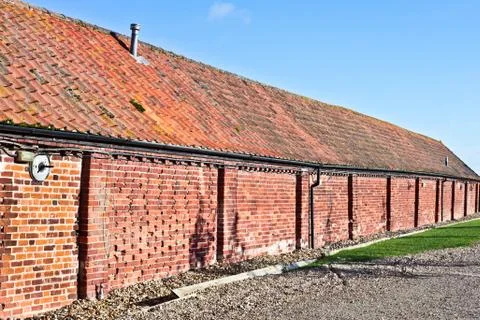 Red brick barn Stock Photos