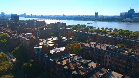 Red brick blocks of flats in the residential area lit by the bright sun. Flying Stock Footage 343662114