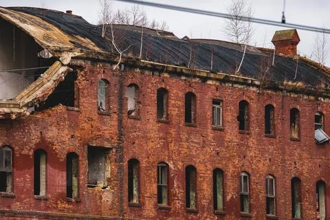 Red Brick Building With Lots of Windows Stock Photos