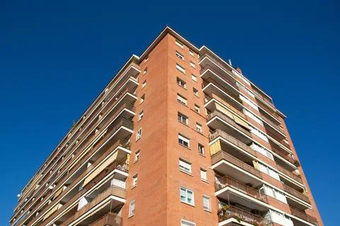 Red brick building in perspective Stock Photos