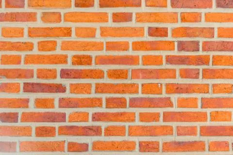 Red brick building wall background close up Stock Photos