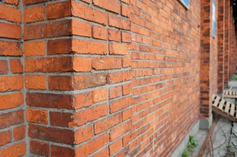 Red brick building wall Stock Photos
