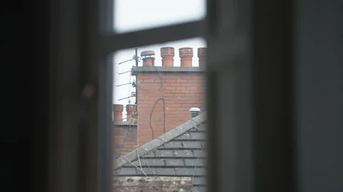 Red Brick Chimney Stack Framed Through A Residential Window Stock Footage 328352304