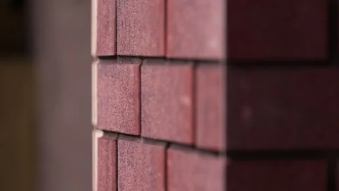 Red brick facade corner under construction close up Stock-Footage 341986514