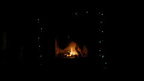 Red brick fireplace with burning fire Stock Footage 115902253