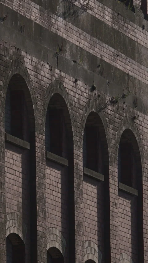 Red brick old derelict building window arch facade Stock Footage 341772053