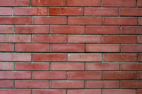 Red brick old wall with cracks, urban background, texture Stock Photos