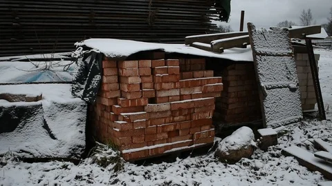Red brick pallet in a building materials warehouse, medium shot Stock Footage 122008748