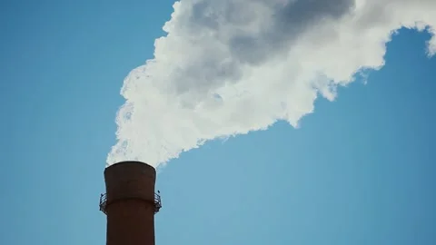 Red Brick Production Pipe with White Smoke against A Bright Blue Sky. Stock Footage 153538955