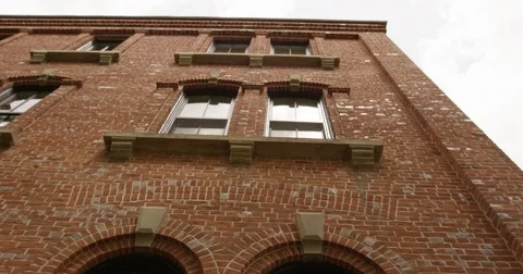 Red brick residental building - setting shot Stock Footage 83957043