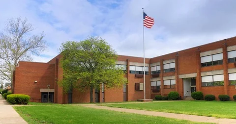 Red Brick School Building with American ... | Stock Video | Pond5