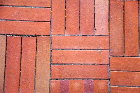 Red brick tiled floor background - close up Stock Photos