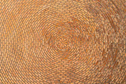 Red brick vault. Ceiling. Circular pattern. Architectural texture Stock Photos