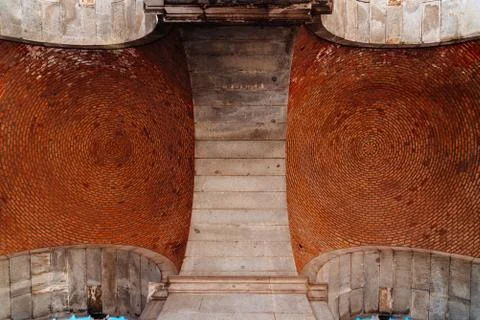 Red brick vault. Ceiling. Circular pattern.Architectural Texture Stock Photos