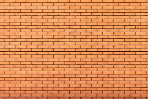 Red brick wall as abstract background Stockfoto's
