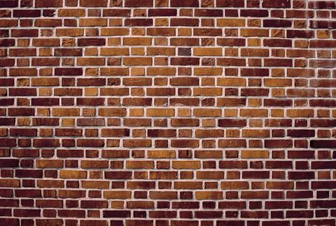 Red brick wall. Abstract background of old wall. Stock Photos