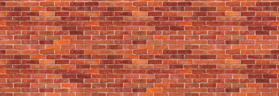 Red brick wall background – brickwall building with exposed brown stone blocks 写真素材