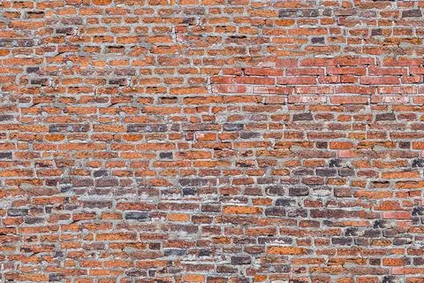 Red brick wall background old and broken, city defensive fort Foto stock