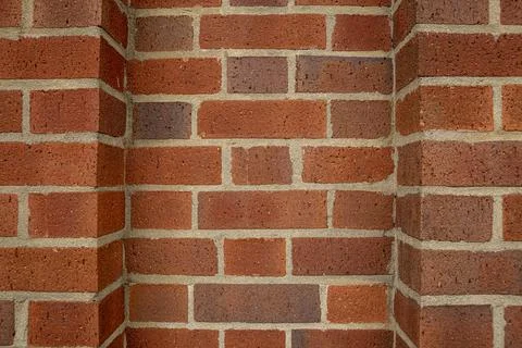 Red brick wall background outside of the building, London, UK. Stock Photos