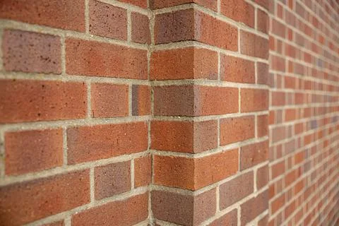 Red brick wall background outside of the building, London, UK. Stock Photos