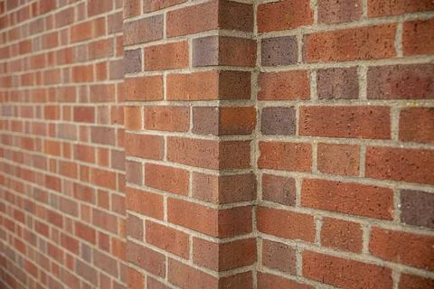 Red brick wall background outside of the building, London, UK. 스톡 사진