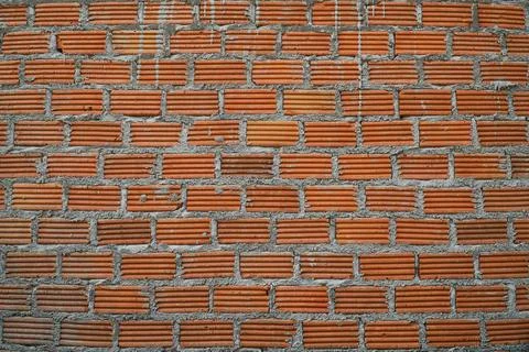 The red brick wall background. Stock Photos
