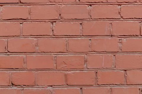 The red brick wall background. Rad bricks in the wall. Stock Photos