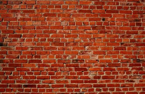 Red brick wall Background of red brick wall pattern texture. Great for gra... Stockfoto's