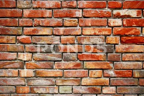 Red brick wall background weathered texture Stock Photos