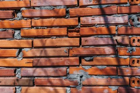 Red brick wall with cement 写真素材
