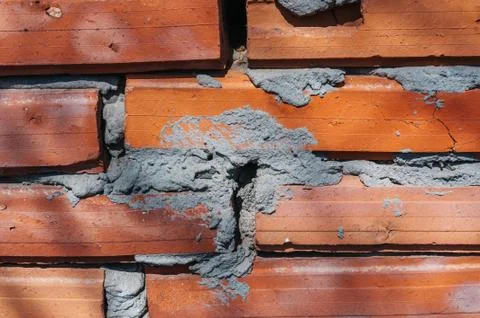 Red brick wall with cement Stock Photos