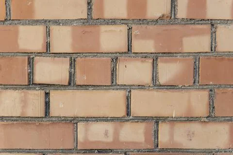 Red brick wall. close-up of brick texture. Stock Photos