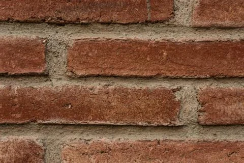 Red brick wall close up view for background. Stock Photos