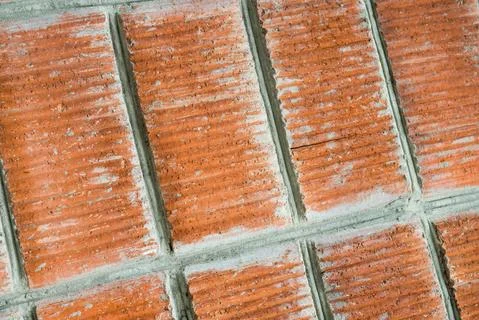 Red brick wall closeup. Background Stock Photos