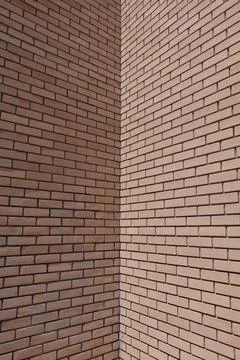 Red brick wall corner building masonry background architectural detail Stock-Fotos