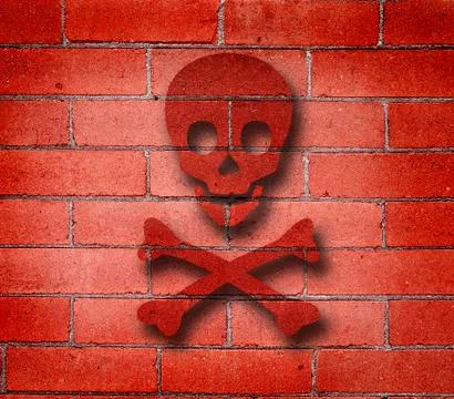 Red Brick Wall with Cross Bones Graffiti Stock Photos